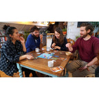 Dixit game in play with players choosing cards – family storytelling game India
