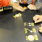 Shit Happens game being played with Lane of Pain lineup visible — dark humour adult card game for groups