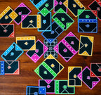 TACTA strategy game with colourful shape matching cards