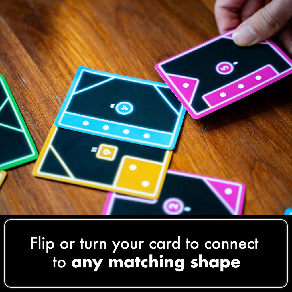 TACTA spatial puzzle and tile placement card game